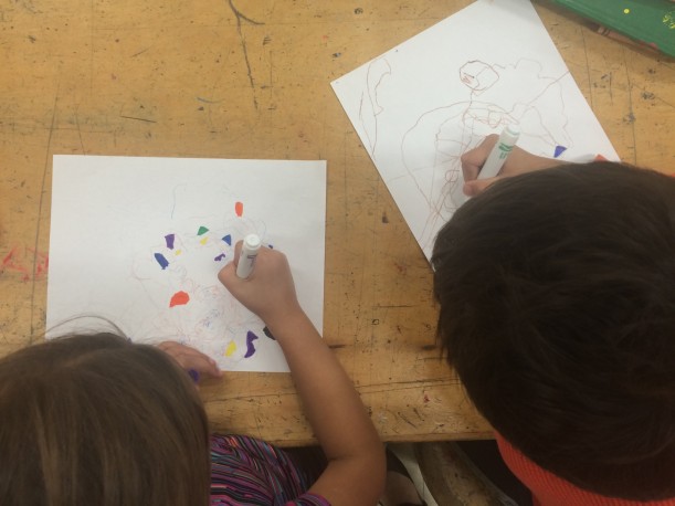 Capture the Light: Students use colored pencils and markers to finish the pieces